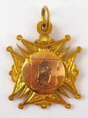 Appraisal: A carat gold medallion engraved with the red hand of