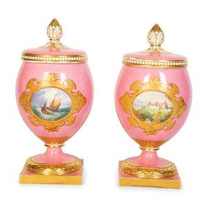 Appraisal: A Pair of English or Continental Porcelain Pink-Glazed Urns Late