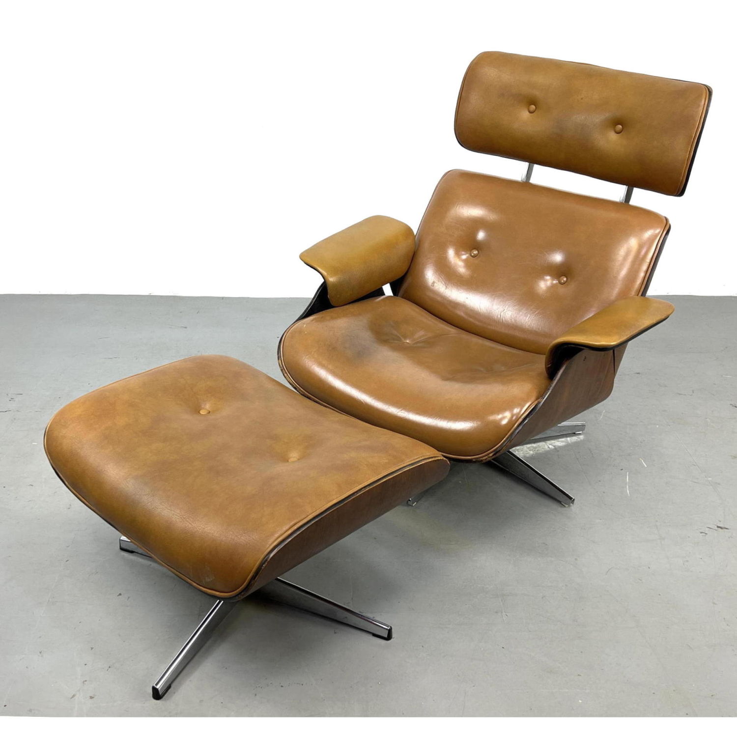 Appraisal: pc Eames style Lounge Chair and Ottoman Light Brown Vinyl