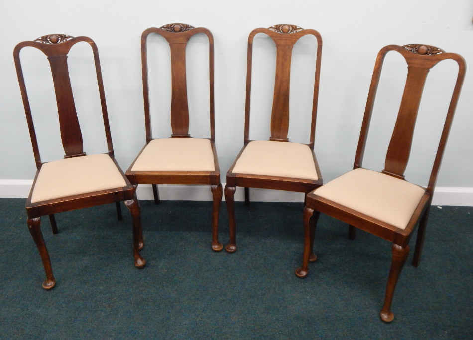 Appraisal: A set of four Edwardian mahogany dining chairs each with