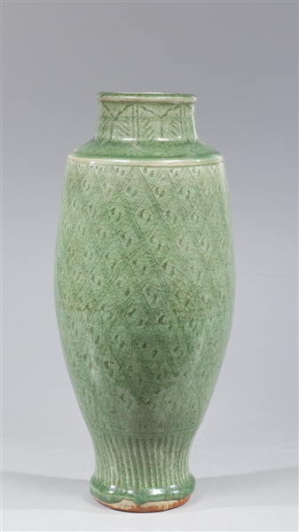 Appraisal: Chinese thickly celadon glazed ceramic vase the body with allover