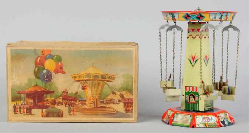 Appraisal: Tin Litho Merry-Go-Round Wind-Up Toy German Working Marked Made in