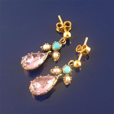 Appraisal: A pair of drop earrings set with a pear shaped