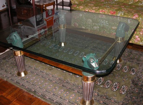 Appraisal: Artist Title Glass and Brass coffee table contained on brass