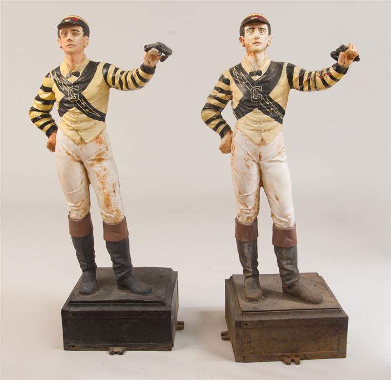 Appraisal: TWO AMERICAN PAINTED CAST-IRON LAWN JOCKEYS in base x in