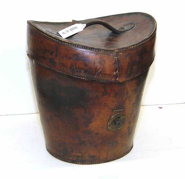 Appraisal: A leather hat box th century Stenciled on side T