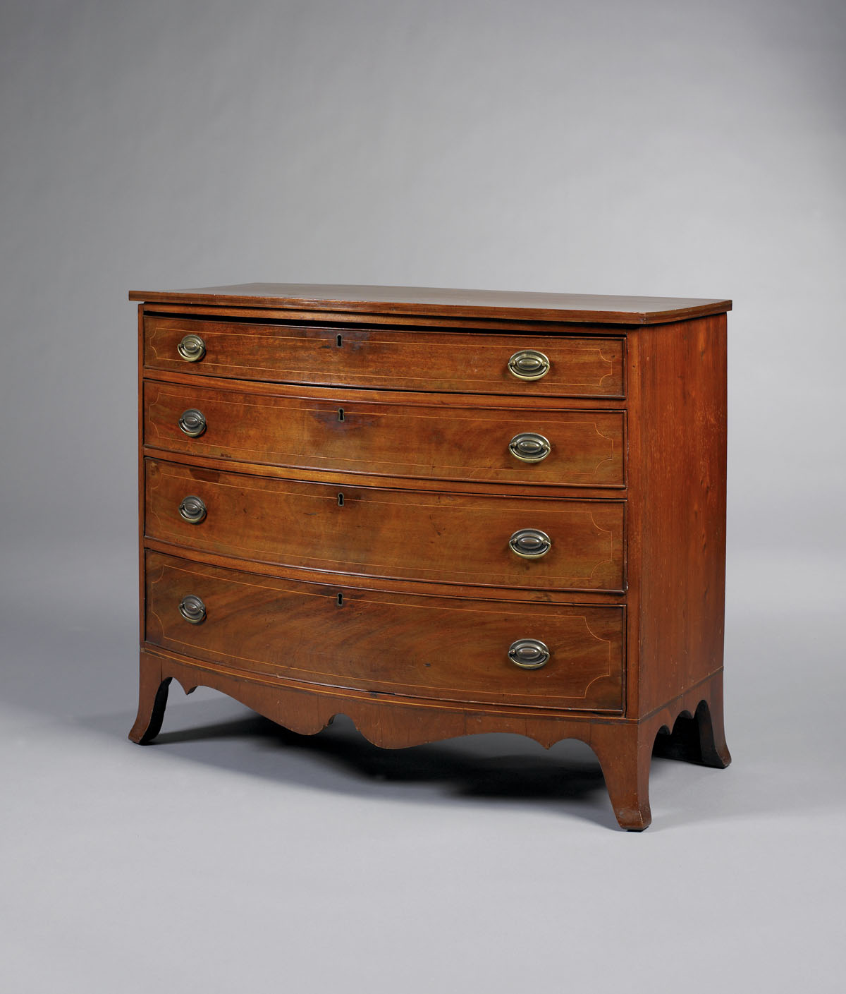 Appraisal: AMERICAN HEPPLEWHITE INLAID MAHOGANY BOWFRONT CHEST OF DRAWERS The rectangular