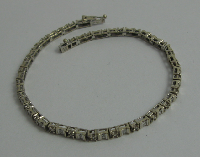 Appraisal: DIAMOND AND K WHITE GOLD BRACELET set with round-cut and