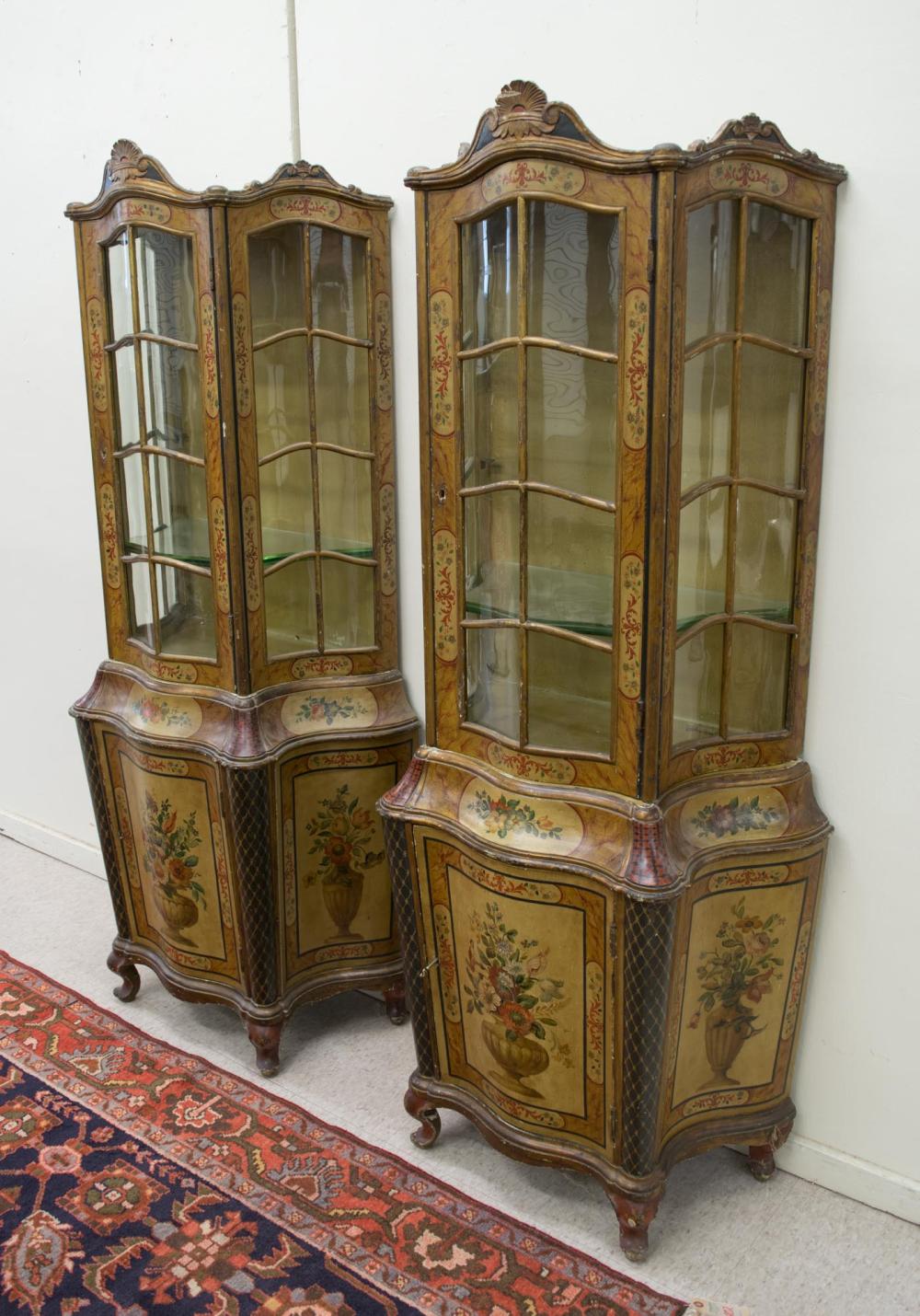 Appraisal: PAIR OF VENETIAN PAINT DECORATED CURIO CABINETS ON CABINETS Italian