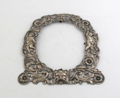 Appraisal: A late th century continental pierced oval frame mount lacking