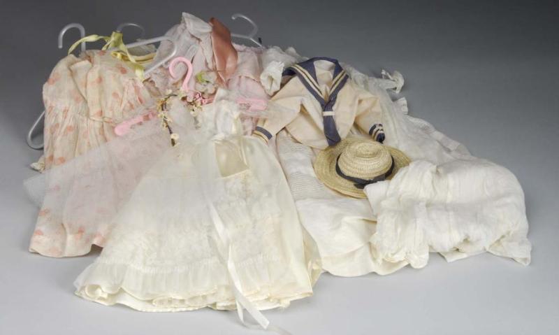 Appraisal: Lot of Vintage Doll Clothing Description Satin bride dress cotton