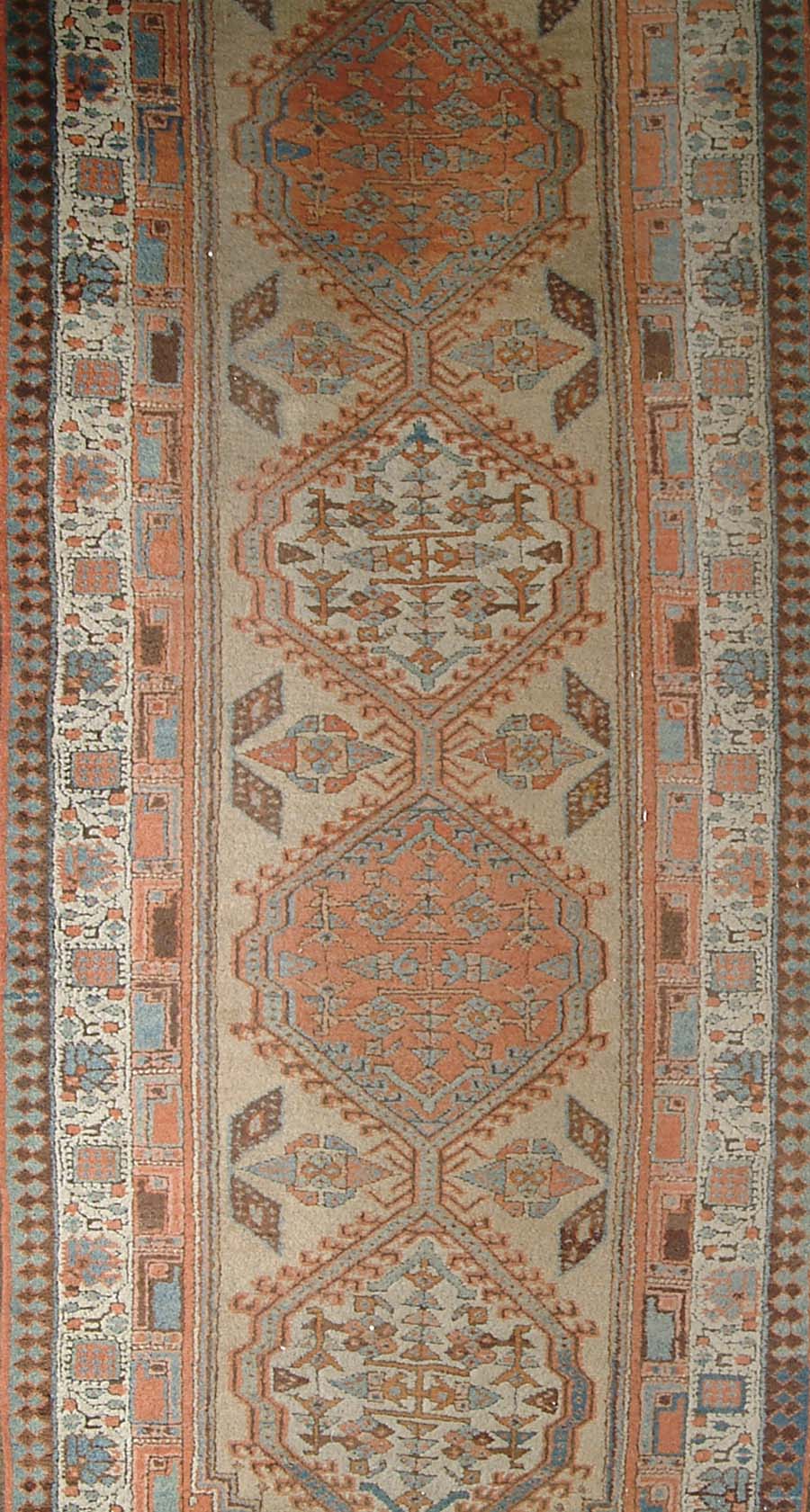 Appraisal: ORIENTAL HALL RUNNER Tan field with five medallions surrounded by