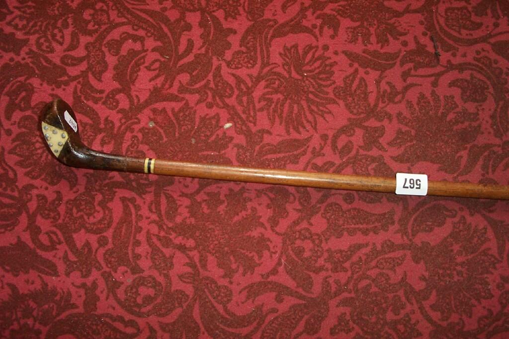 Appraisal: A walking stick in the form of a hickory shafted