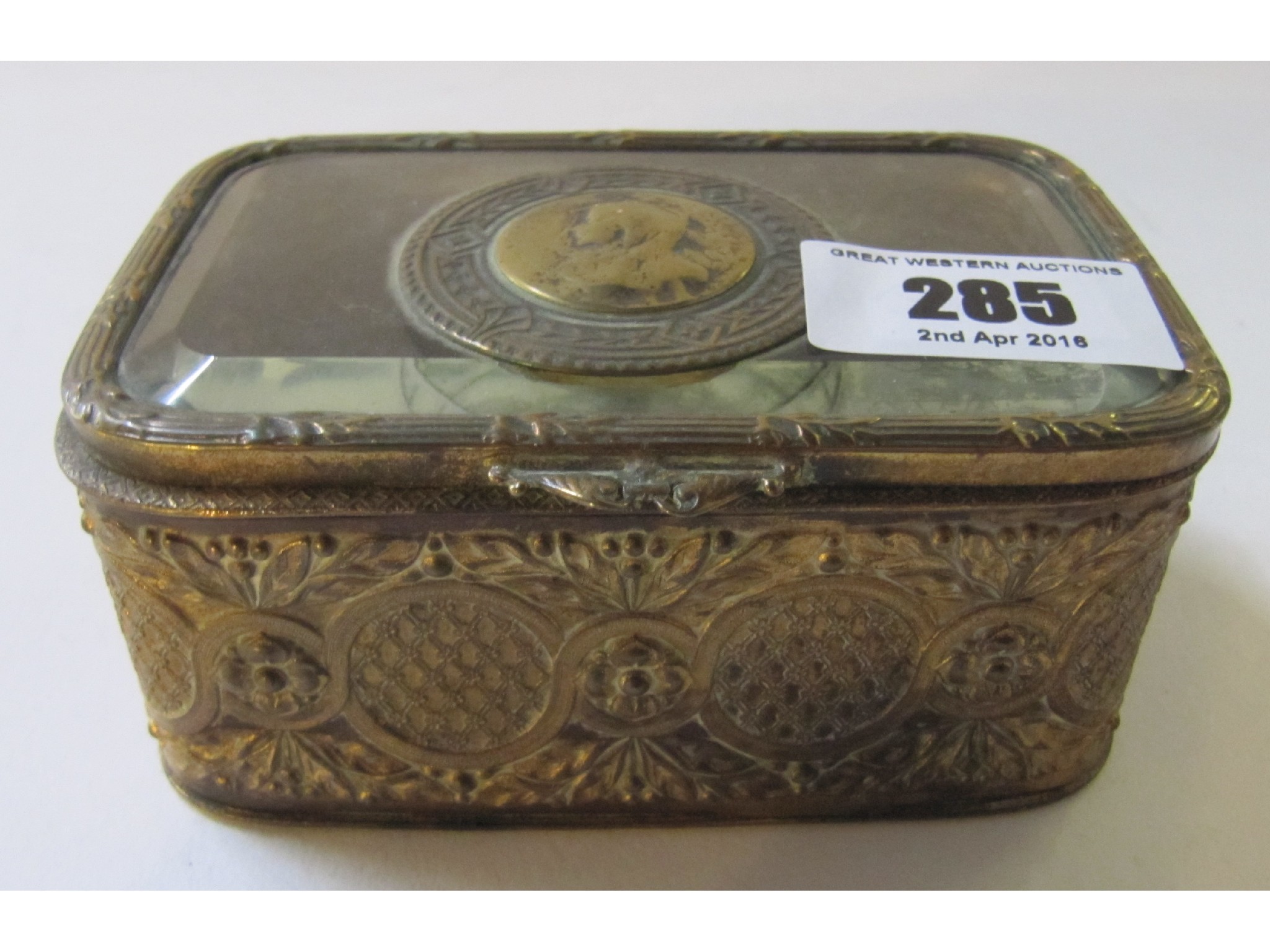 Appraisal: A gilt metal and glass trinket box the lid with