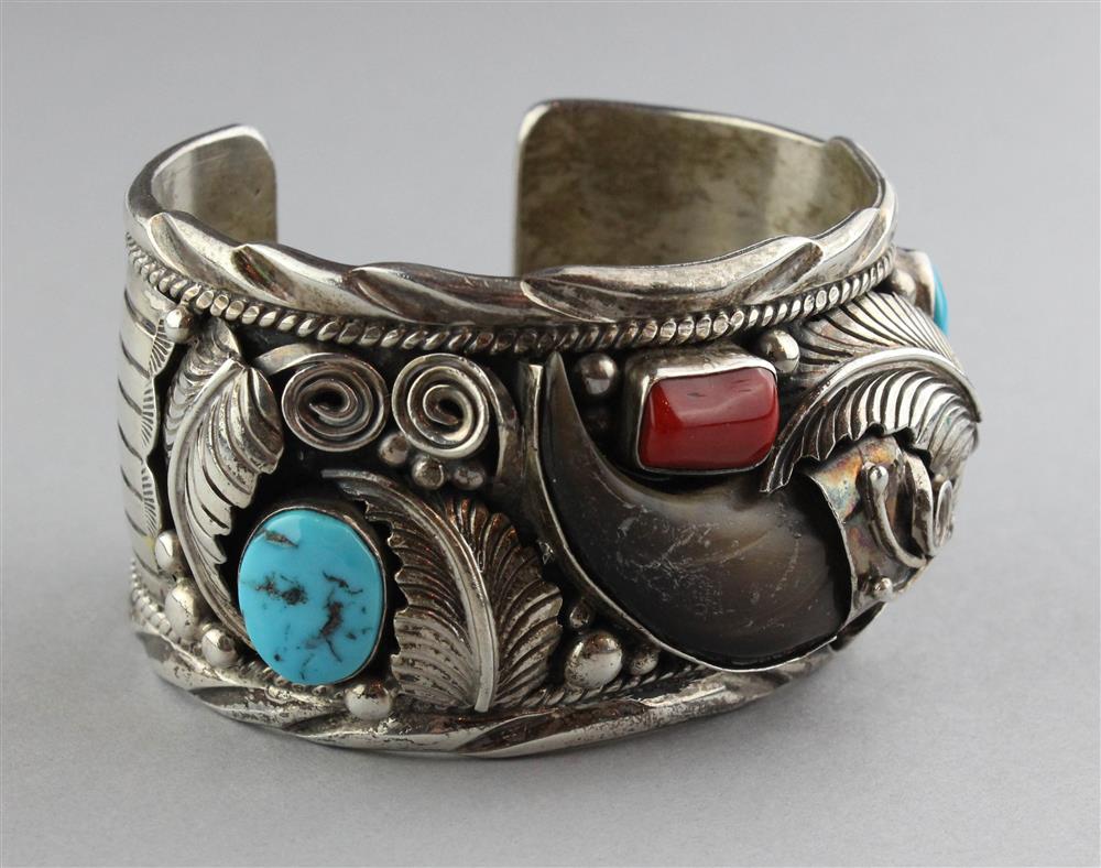 Appraisal: A JAKE NATIVE AMERICAN ARTIST STERLING CUFF WITH TURQUOISE AND