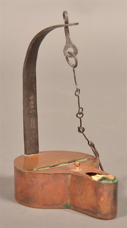 Appraisal: Copper and Wrought Iron Betty Lamp Copper and Wrought Iron