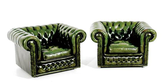 Appraisal: Pair green leather club chairs th century continuous back and