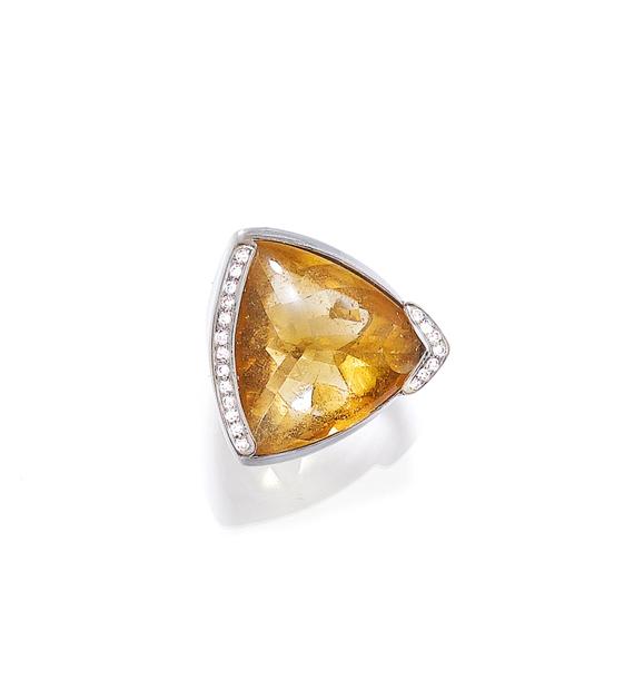 Appraisal: GOLD CITRINE AND DIAMOND RING White gold g Casual-elegant solid