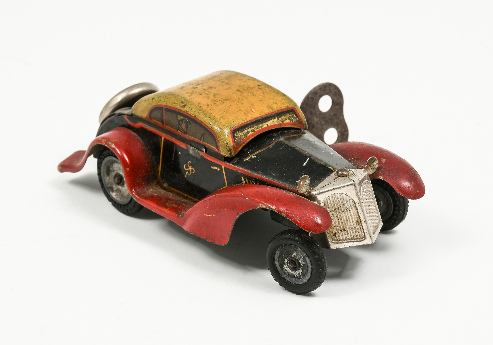 Appraisal: GERMAN TIN WIND-UP TOY CAR Early th century German Tin