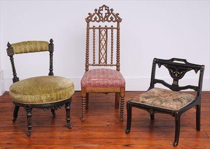 Appraisal: AMERICAN ELIZABETHAN REVIVAL CARVED WALNUT SLIPPER CHAIR AND A LOUIS