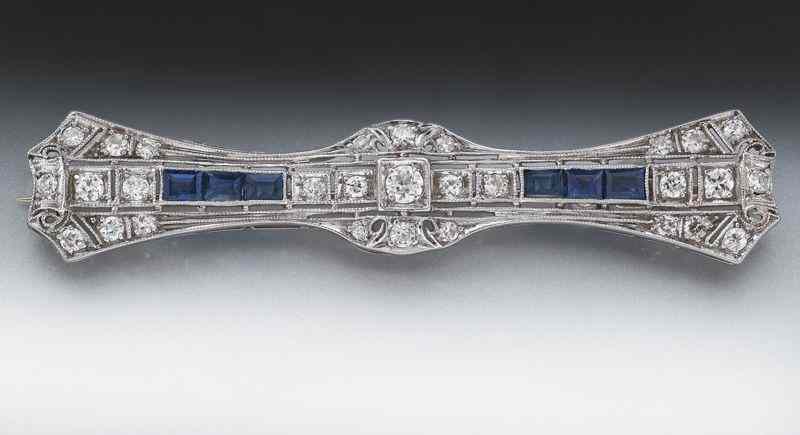 Appraisal: Art Deco platinum diamond and sapphire broochfeaturing old European cut