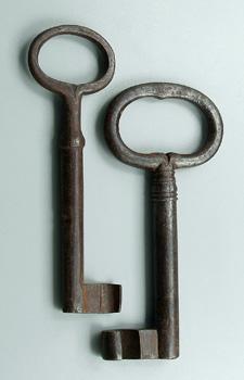 Appraisal: Two muzzle-loading iron key guns shaped as large key fire