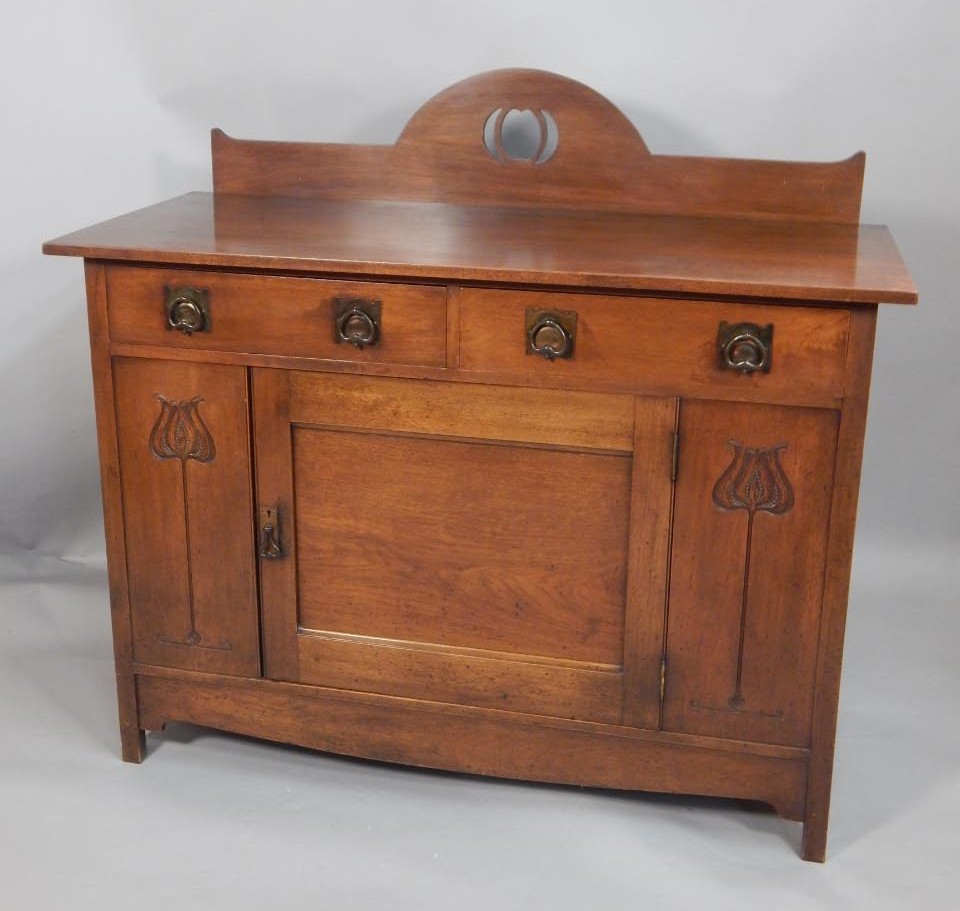 Appraisal: A late thC Art Nouveau style sideboard the top with