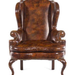 Appraisal: A Queen Anne Style Faux Leather Upholstered Wingback Armchair th