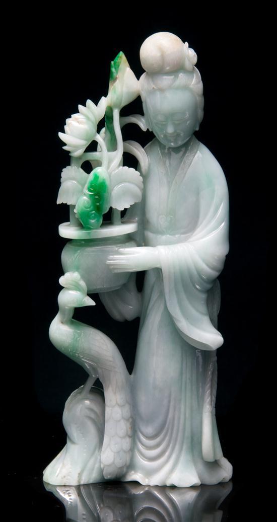 Appraisal: Jade Figure of Guanyin of green and white stone depicting