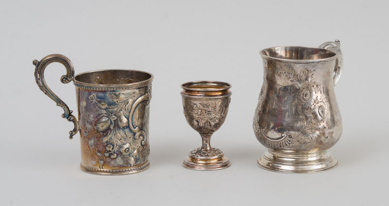 Appraisal: TWO REPOUSS PRESENTATION SILVER MUGS AND A SILVER EGG CUP