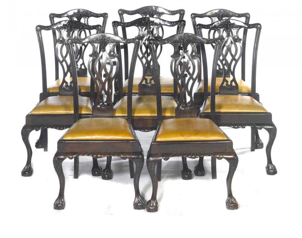 Appraisal: A SET OF EIGHT MAHOGANY DINING CHAIRS the back carved