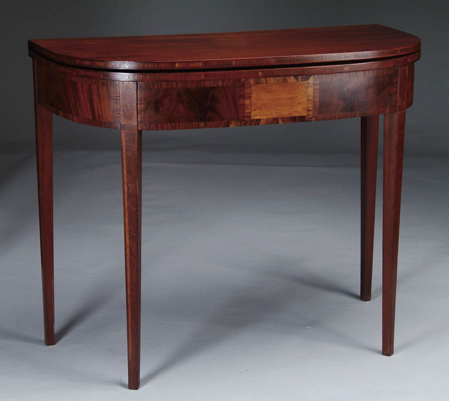 Appraisal: INLAID MAHOGANY HEPPLEWHITE CARD TABLE D-shaped fold over lid has