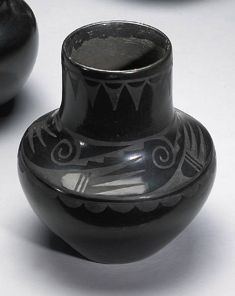 Appraisal: A San Ildefonso blackware jar Carmelita Dunlap painted above the