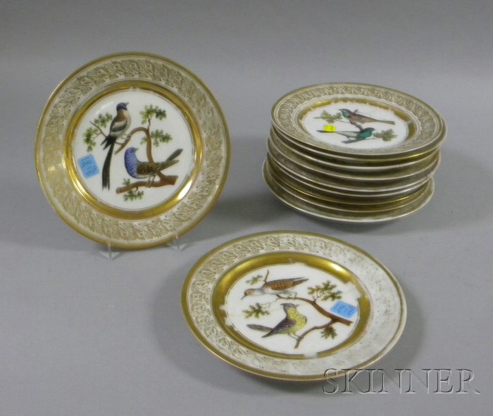 Appraisal: Set of Eleven Gilt and Hand-painted Ornithological Decorated Porcelain Plates