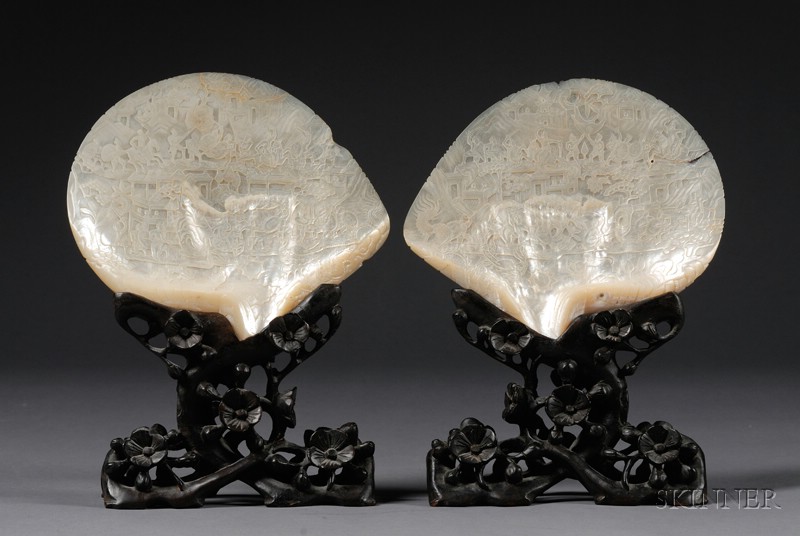 Appraisal: Pair of Carved Mother-of-Pearl Shells China th century scenes of