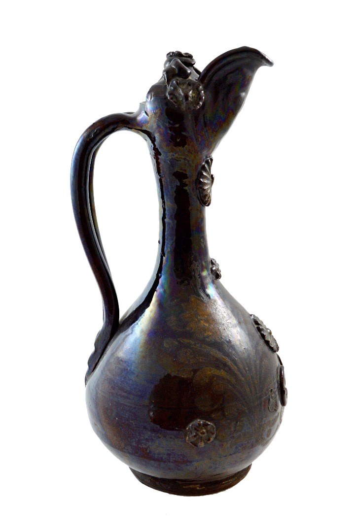 Appraisal: A Channakale Turkey pottery ewer th century with applied decoration