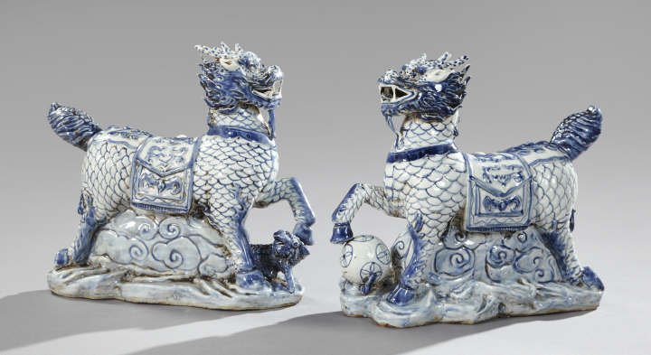 Appraisal: Pair of Kuang Hsu Porcelain Figures of Caparisoned Kylins the