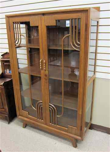 Appraisal: ART DECO STYLE CABINET BOOKCASE of solid teak construction with