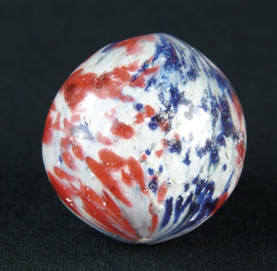 Appraisal: ONIONSKIN MARBLE W MICA This marble is red white blue