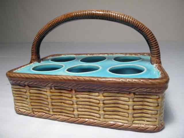 Appraisal: A Majolica pottery egg basket Brown basket weave pattern with