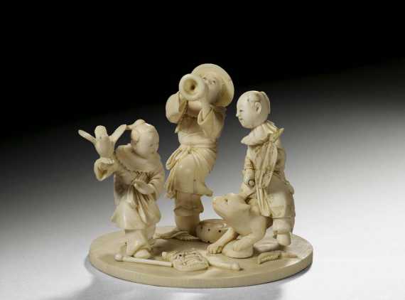 Appraisal: IVORY OKIMONO DEPICTING THREE CHILDREN Japan Meiji-period L cm Signed