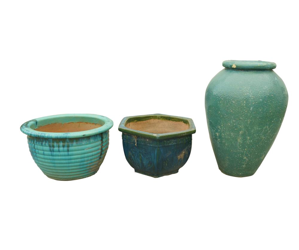 Appraisal: THREE GREEN GLAZED PLANTERSthe first a jar inches diameter inches