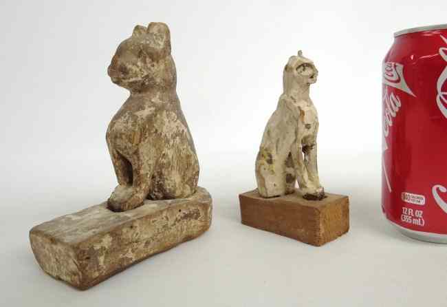 Appraisal: Lot two early folk art cat carvings Each rests into