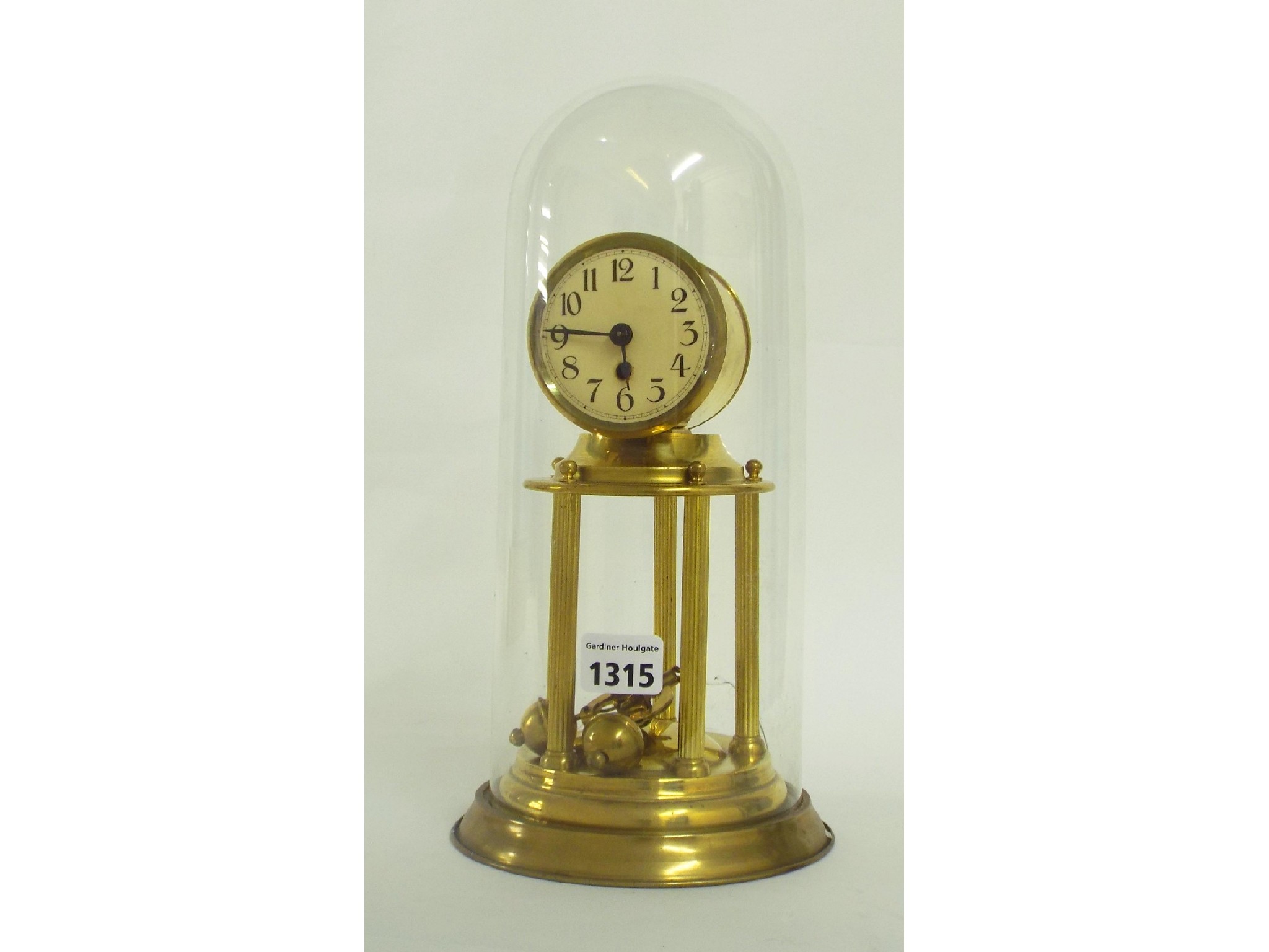 Appraisal: Torsion thirty day mantel clock the circular dial within a