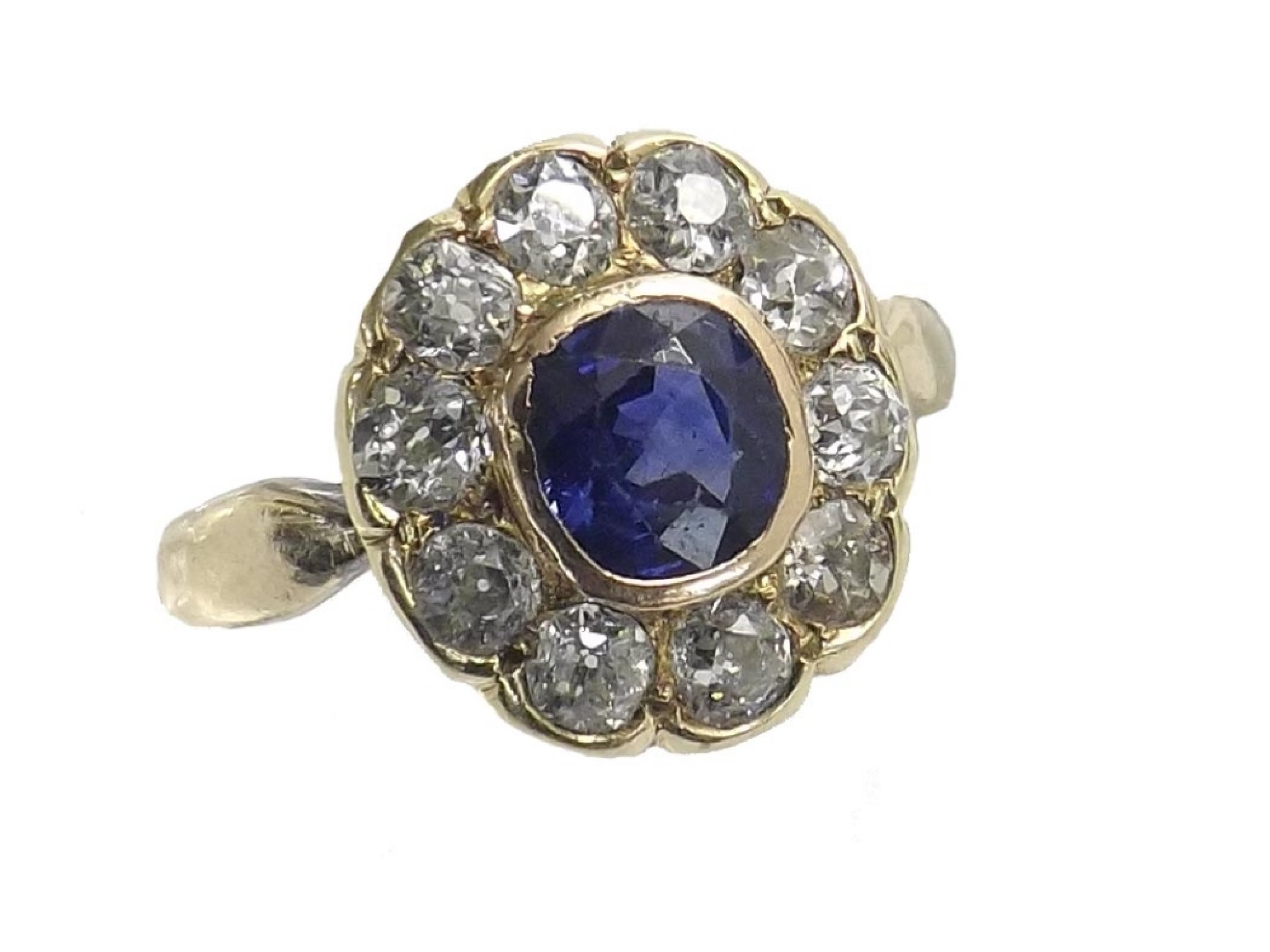 Appraisal: Good sapphire and diamond oval cluster ring the central sapphire