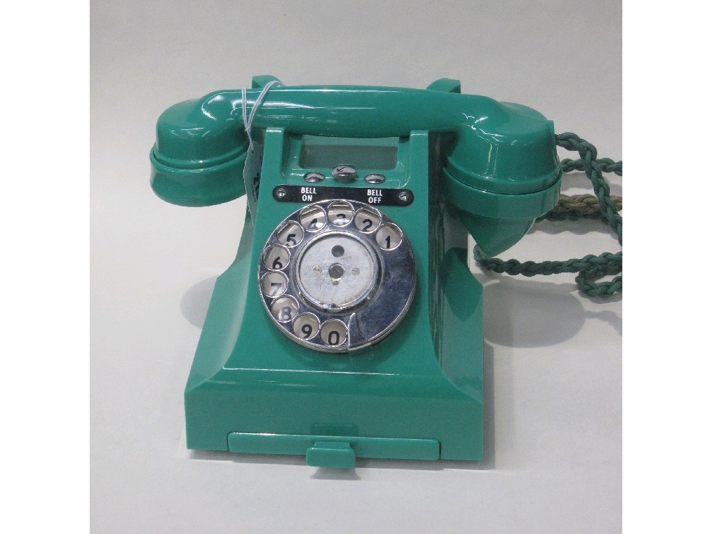 Appraisal: s green bakelite telephone of pyramid shape numbered CB PL