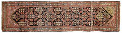 Appraisal: Persian runner rectilinear and floral designs on blue black field