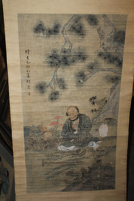 Appraisal: A CHINESE SCROLL depicting a seating Daoist Immortal th Century