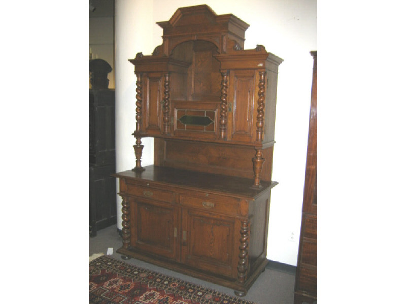 Appraisal: CONTINENTAL HENRI II OAK BUFFET Top member with a central