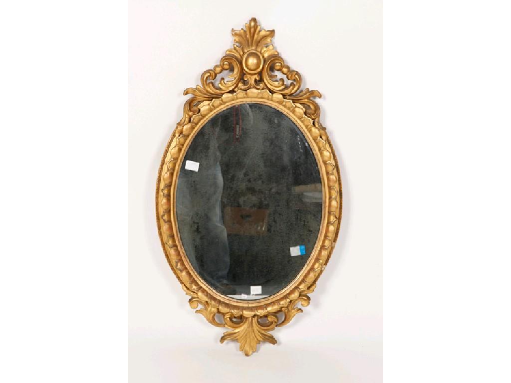 Appraisal: A VICTORIAN OVAL GILT FRAMED WALL MIRROR the oval plate